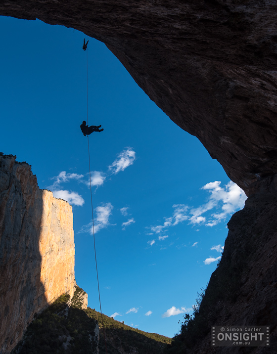 Chris Sharma and Klemen Becan descend after a hard days work on Chris' hard muliti-pitch project, Mont-rebei, Spain.